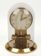 JUNGHANS ATO German electric impulse clock in glass dome, early 20th century, 28cm high