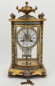 A fine quality antique French bow fronted four glass mantle clock in ormolu case with champlevé enamel decoration, eight time and gong striking movement by MARTI with mercury compensated pendulum, 19th century, 37cm high