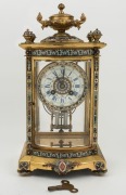 A fine quality antique French bow fronted four glass mantle clock in ormolu case with&nbsp;champlev&eacute;&nbsp;enamel decoration, eight time and gong striking movement by MARTI&nbsp;with mercury compensated pendulum, 19th century, 37cm high