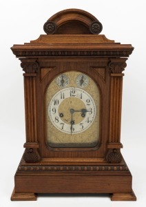 An antique German spring table clock in walnut case with triple train chime and striking movement, 19th/20th century, 49cm high