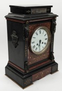 A fine antique French mantle clock in Belgium black slate and rouge marble case with incised and gilt decoration and bronzed mounts, eight day time and bell striking movement with Roman numerals, 19th century. bearing silver presentation plaque "KERANG DI - 2