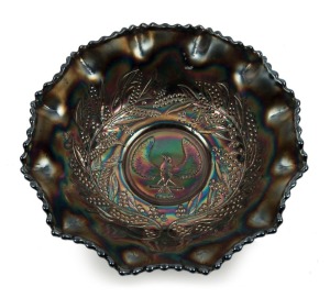"Shrike" amethyst carnival glass master bowl, 8cm high, 24cm wide