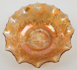 "Kookaburra" marigold carnival glass master bowl, 8.5cm high, 24cm wide