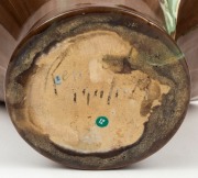 REMUED&nbsp;green and brown glazed basket vase with applied gumnuts and leaf with branch handle,&nbsp; incised "Remued 194/10M", 20cm high x 26cm wide - 4