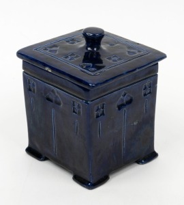 HARVEY SCHOOL blue glazed pottery jar with lid, incised "1936" with artists monogram (illegible), 11.5cm high Note: badly damaged and restored, several chips and imperfections.