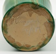 REMUED&nbsp;green and cream glazed pottery jug with applied branch handle, gumnuts and leaf, incised "Remued 54/8M", 25cm high - 3