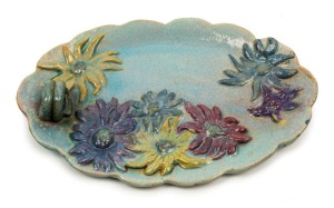 UNA DEERBON pottery platter with applied floral decoration and ring handle, incised "Deerbon", 24cm wide