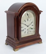 GUSTAV BECKER antique German mantle clock in mahogany case with break arch top and full length pillars, eight day quarter chiming three train movement with chime/silent subsidiary dial and Roman numerals on silvered dial, early 20th century, bearing prese - 2