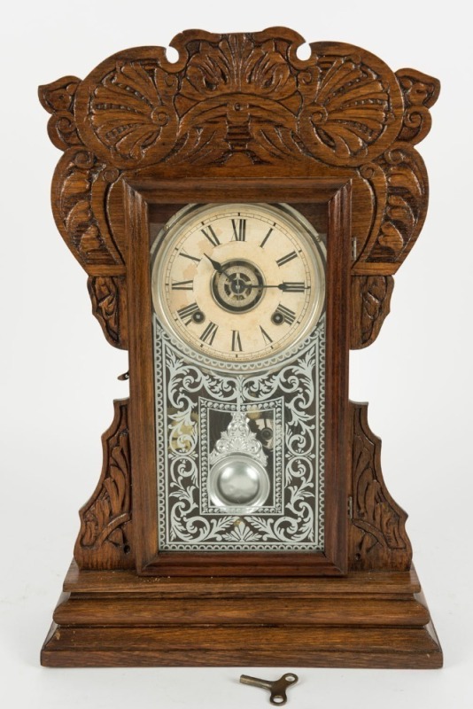 ANSONIA antique American parlour clock in pressed oak case, eight day time and strike movement with alarm function, 19th century, ​​​​​​​54cm high