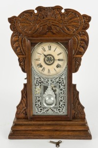 ANSONIA antique American parlour clock in pressed oak case, eight day time and strike movement with alarm function, 19th century, 54cm high