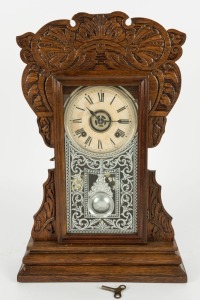 ANSONIA antique American parlour clock in pressed oak case, eight day time and strike movement with alarm function, 19th century, ​​​​​​​54cm high