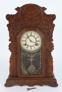 WATERBURY antique American cottage clock with pressed oak case, eight day time and strike movement with Roman numerals, 19th century, ​​​​​​​56cm high