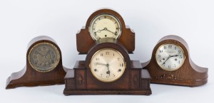 Four timber cased Napoleon hat mantle clocks, two and three train movements, American, German and English manufacturers, early 20th century, the largest 24.5cm high, 40cm wide