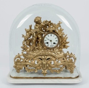 An antique French gilt metal mantle clock in glass dome with marble base, 19th century. Note: Re-gilded. 44cm high overall