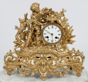 An antique French gilt metal mantle clock in glass dome with marble base, 19th century. Note: Re-gilded. 44cm high overall - 2