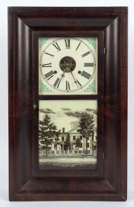 An antique American wall clock in mahogany case with time and strike movement and Roman numerals, 65cm high