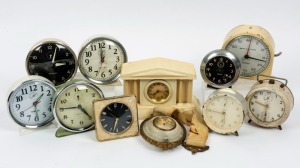 Eleven assorted alarm clocks, wall clock and table clock, mixed vintages and condition, early to mid 20th century, the largest 12cm high