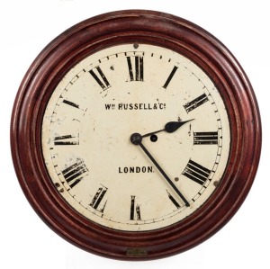 An antique English station clock with chain fusee movement, dial signed "Wm. RUSSELL & Co.", 19th century, (missing bezel and glass), 46cm diameter overall