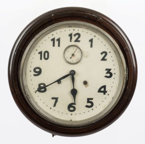 An antique American wall clock in timber case with time and strike movement, Arabic numerals and subsidiary dial, 19th century, 42cm diameter overall