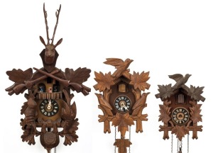 Three vintage Black Forest wall clocks, 20th century, (incomplete), the largest including pendulum 65cm high