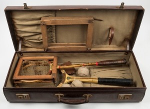 A fitted leather case containing a Slazenger "Ambassador" racquet with spring-press frame; a "Gordon J. Watson" squash racquet by Alexander, with an SBK spring-press frame; and three tennis balls.; circa 1950s.