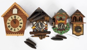 Four vintage German weight driven Black Forest Cuckoo clocks, one with waterwheel automata, 20th century, ​​​​​​​the largest 29cm high