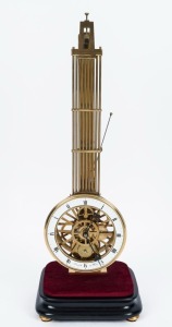 A good quality reproduction skeletonized swinging pendulum clock with faux gridiron pendulum, knife edge suspension and pin wheel escapement, enamel chapter marked "BRANDT IN WIEN", late 20th century, 57cm high