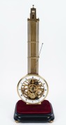 A good quality reproduction skeletonized swinging pendulum clock with faux gridiron pendulum, knife edge suspension and pin wheel escapement, enamel chapter marked "BRANDT IN WIEN", late 20th century, 57cm high