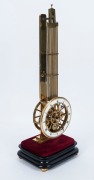 A good quality reproduction skeletonized swinging pendulum clock with faux gridiron pendulum, knife edge suspension and pin wheel escapement, enamel chapter marked "BRANDT IN WIEN", late 20th century, 57cm high - 2