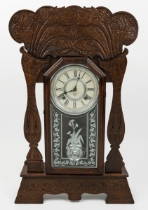 ANSONIA antique American mantle clock in pressed oak case, eight day time and strike movement with Roman numerals, 19th century, 62cm high