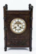 An antique French mantle clock in unusual Japanese style timber and metal case, eight day time and strike movement with open escapement and Roman numerals, 19th century, 38cm high