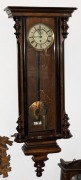A Vienna regulator wall clock in walnut and ebonised timber case, single weight movement with enamel dial and Roman numerals, 19th century, ​​​​​​​116cm high