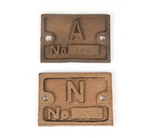 Sydney Trams &ndash; Metal indicator signs, showing both the class and tram no. (viz: N No.2870; A No.114), 6.5 x 9cm. Class letters are embossed and trams numbers are engraved. (2 signs).