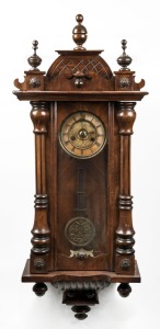 An antique Viennese wall clock in walnut case with spring driven musical movement, 19th/20th century, 96cm high