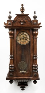 An antique Viennese wall clock in walnut case with spring driven musical movement, 19th/20th century, 96cm high