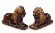 BENDIGO POTTERY lion doorstops with Rockingham glaze, 19th century, ​​​​​​​16cm high, 26cm long