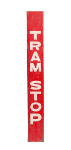 TRAM STOP SIGN (believed to be an early Brisbane sign) &ldquo;Tram Stop&rdquo;, white downwards-facing lettering on red 3D metal, designed to go around a pole, 71.5 x 9 x 3cm. Minor scratches but good condition.