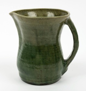 MERRIC BOYD green glazed pottery jug, signature obscured by glaze, 13cm high