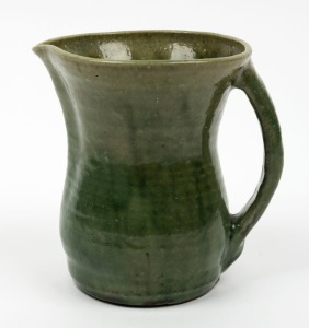 MERRIC BOYD green glazed pottery jug, signature obscured by glaze, ​​​​​​​13cm high 