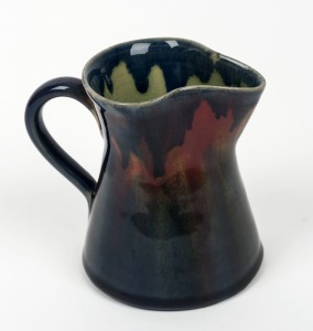 P.P.P. (PREMIER POTTERY PRESTON) pottery jug win unusual mottled glaze, 10cm high