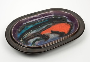 ELLIS pottery platter with purple, blue and orange glaze, incised "Ellis", ​​​​​​​34.5cm wide