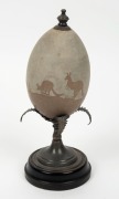 An Australian sterling silver mounted emu egg with carved kangaroo hunting scene, 19th century, stamped "STG. SIL.", ​​​​​​​24cm high - 3