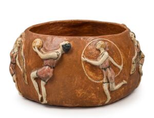 E.B. WILLIS Australian pottery bowl adorned with raised figures of women in sporting poses, incised "Hand Made by E.B. WILLIS, 1935", 11.5cm high, 22.5cm wide Provenance: The Estate of Ray Hughes, Private Collection Melbourne