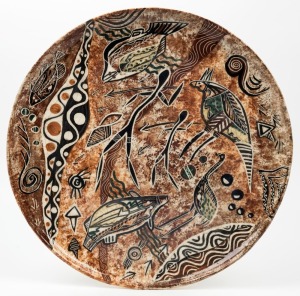 ISOBEL Australian pottery charger decorated with Aboriginal designs, signed "Isobel Australia, Hand Painted, Helen", ​​​​​​​42cm diameter