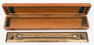 An English brass rolling navigation rule, in timber case, 20th century, ​​​​​​​the box 48cm wide