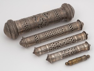 A group of five assorted silver plated scroll holders, 19th and 20th century, the largest 30cm long