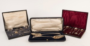 Boxed sterling silver Apostle spoons and sugar tongs, together with a pair of sterling silver berry spoons, plus a sterling silver vanity set in case, (3 items)