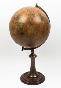 A reproduction globe of the world, 59cm high