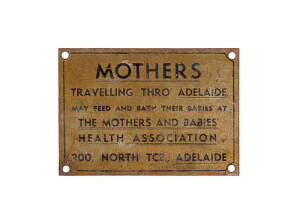 Melbourne/Adelaide Express Sign: &ldquo;MOTHERS TRAVELLING THRO&rsquo; ADELAIDE may feed and bath their babies at THE MOTHERS AND BABIES&rsquo; HEALTH ASSOCIATION, 200, NORTH TCE., ADELAIDE.&rdquo; Black lettering on brass, 7.5 x 11cm.