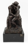 (after) AUGUSTE RODIN, "The Kiss", cast bronze statuette on ebonized plinth, ​​​​​​​32cm high